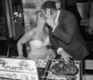 Davis Wedding | Rochester Wedding DJ | Ravenwood Country Club - bride and groom on the turntables